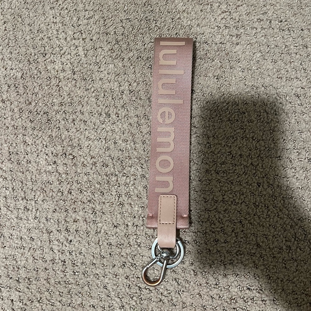 Lululemon keychain in pink